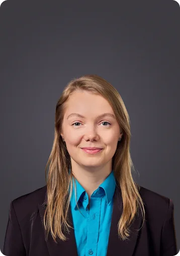 Professional headshot of Viktoria Randalainen against gray background
