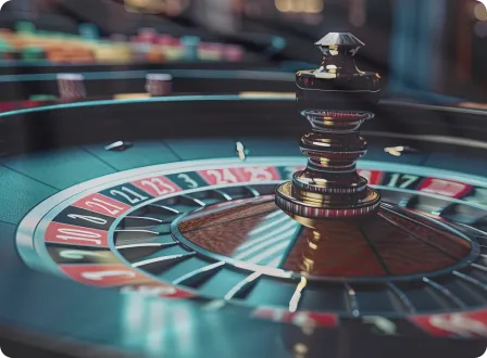 Casino roulette wheel with ball and numbered compartments