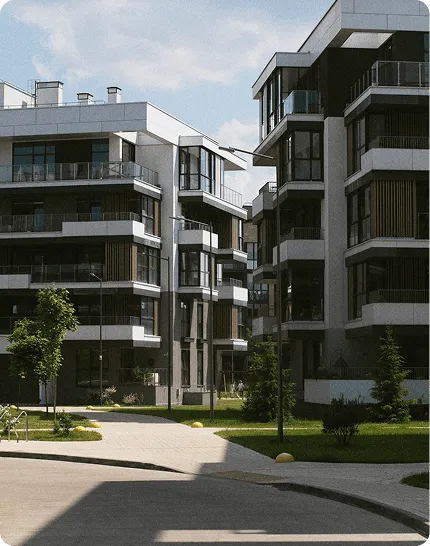 Modern residential buildings with balconies and courtyard